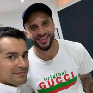 Kyle Walker with dentist in waiting area